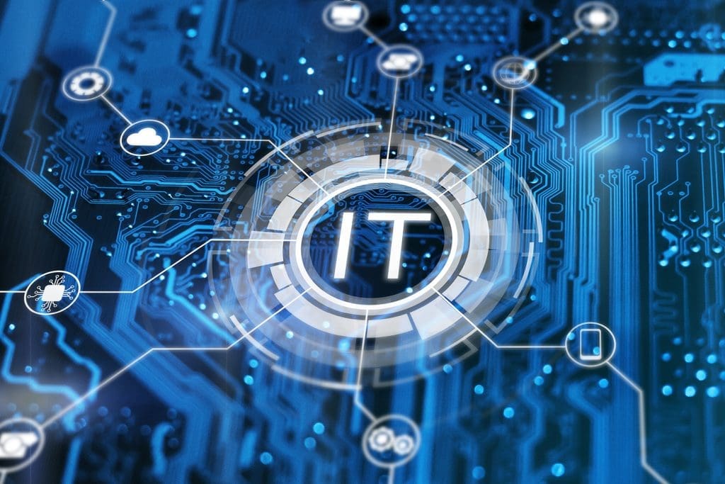 A a white IT symbol hovering over a circuit board with floating relative icons surrounding it.