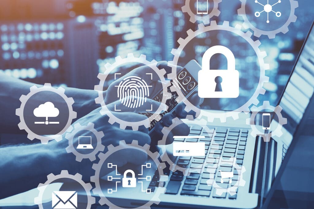 White cybersecurity icons hover over a person using a laptop.